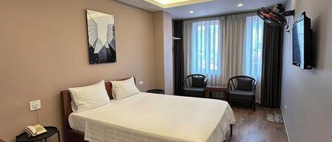 Habitación doble superior, para no fumadores, vista a la ciudad | Ropa de cama de alta calidad y camas con efecto memoria