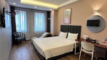 Deluxe Double Room, Non Smoking, City View | In-room safe, desk, laptop workspace, blackout drapes