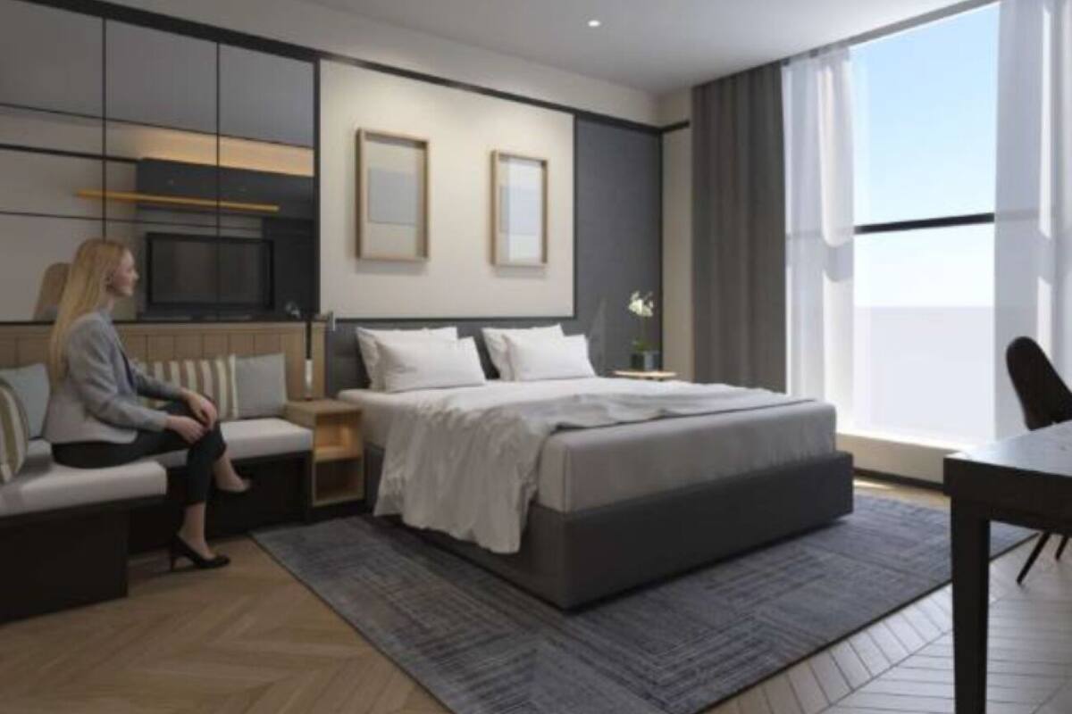 A modern bedroom with a bed, sofa, TV, and large windows.