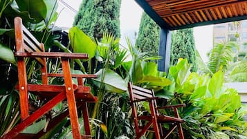 Deluxe Double Room, Garden View | Terrace/patio