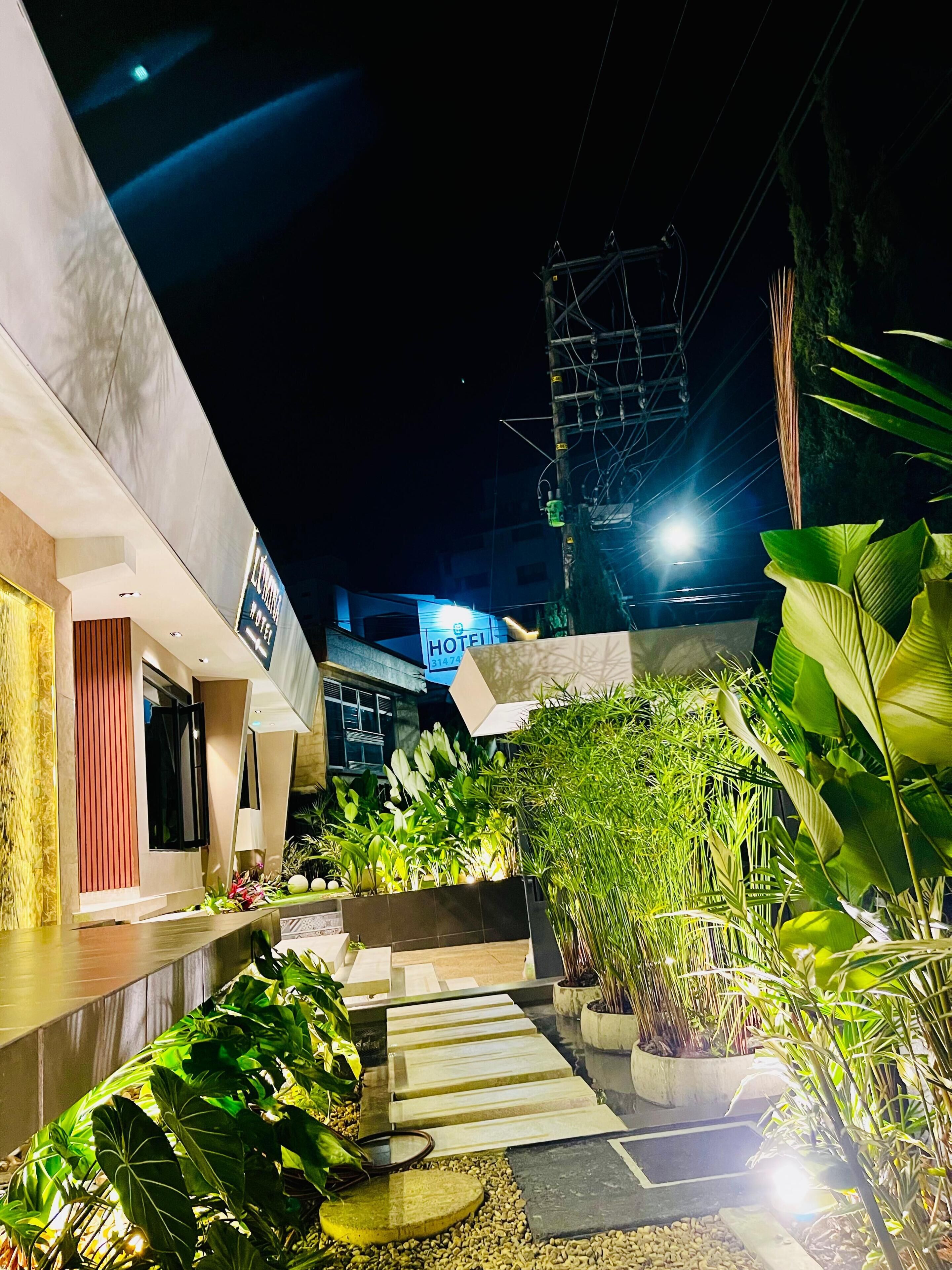 Habitación doble Deluxe, vista al jardín | Terraza o patio