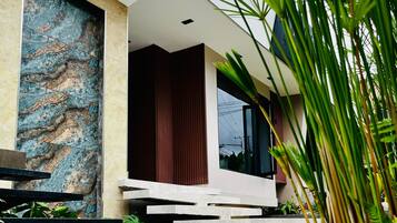 Deluxe Double Room, Garden View | Terrace/patio