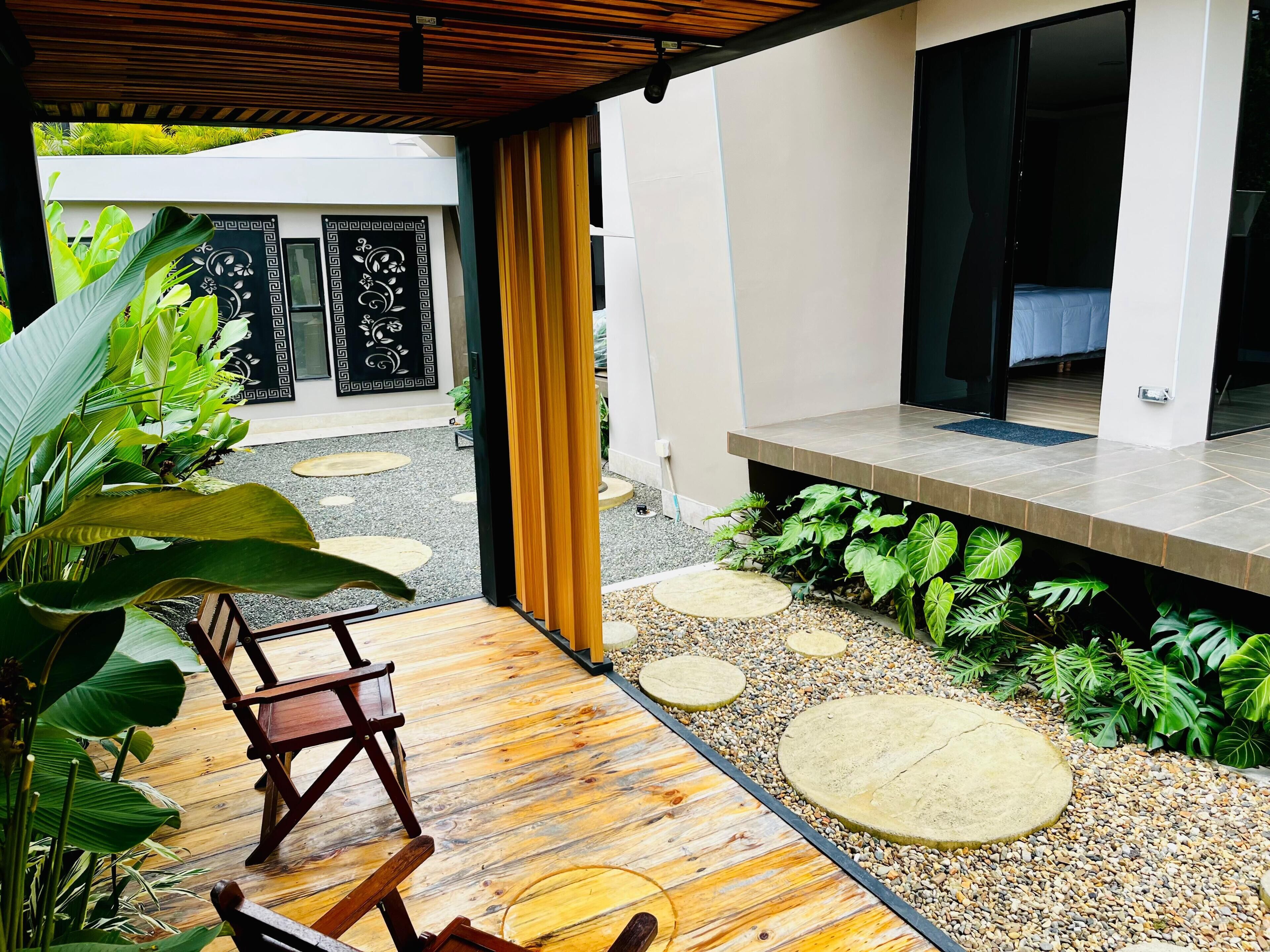 Habitación doble Deluxe, vista al jardín | Terraza o patio