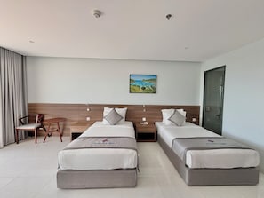 Deluxe Twin Room, Beach View | Minibar, free WiFi, bed sheets - Long Thuan Hotel & Resort (Khanh Hoa)