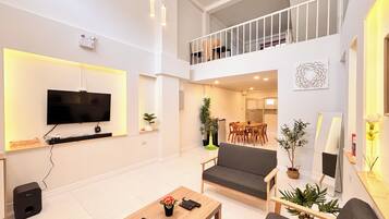 Family House, 2 Bedrooms | Living area | 32-inch flat-screen TV with cable channels