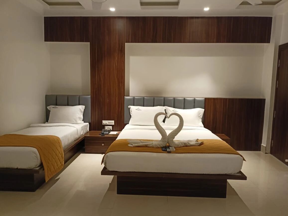 Deluxe Triple Room, Courtyard View | Blackout curtains, iron/ironing board, free WiFi
