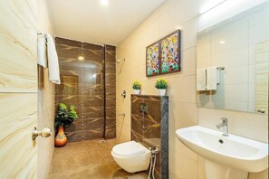 Deluxe Triple Room, Courtyard View | Bathroom | Shower, towels, soap, shampoo - SRS Jade Empire (Bangalore)