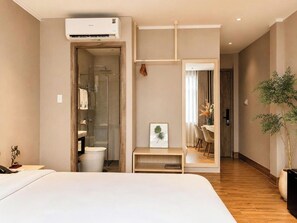 Deluxe Double Room | Bathroom | Shower, hair dryer, towels, soap - Amana Living Phan Xich Long (Ho Chi Minh)
