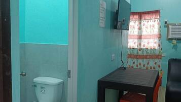 Quadruple Room | Bathroom | Shower, rainfall showerhead, towels, soap