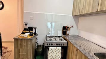 Family Apartment, Balcony, City View | Private kitchen