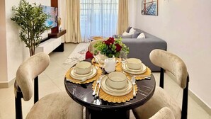 Family Apartment, Balcony, City View | Living area - Grand Midtown apartments (Nairobi)
