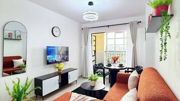 Comfort Apartment, Balcony | Living area