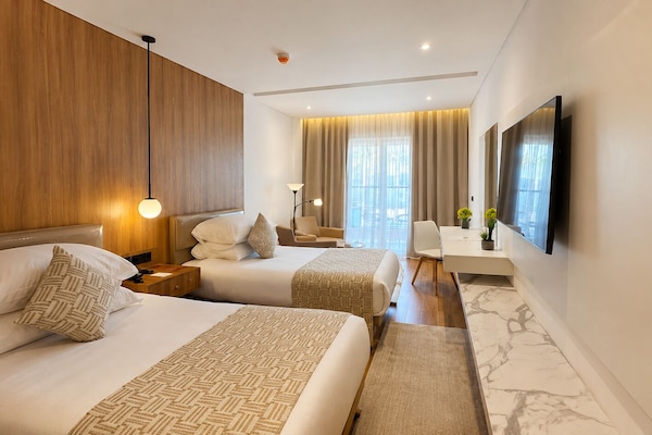 Superior Double or Twin Room, Balcony, Sea View | Minibar (some free items), in-room safe, blackout drapes
