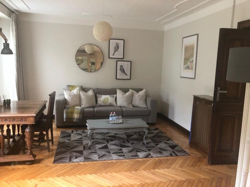 Deluxe Triple Room, Balcony, Garden View | Living area