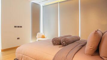 Family Villa, Garden View | Desk, blackout drapes, iron/ironing board