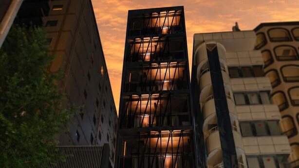 A modern hotel with a prominent entrance, multiple floors, and a unique architectural design. - OYADO LANTERN NAKASU KAWABATA (Fukuoka City)