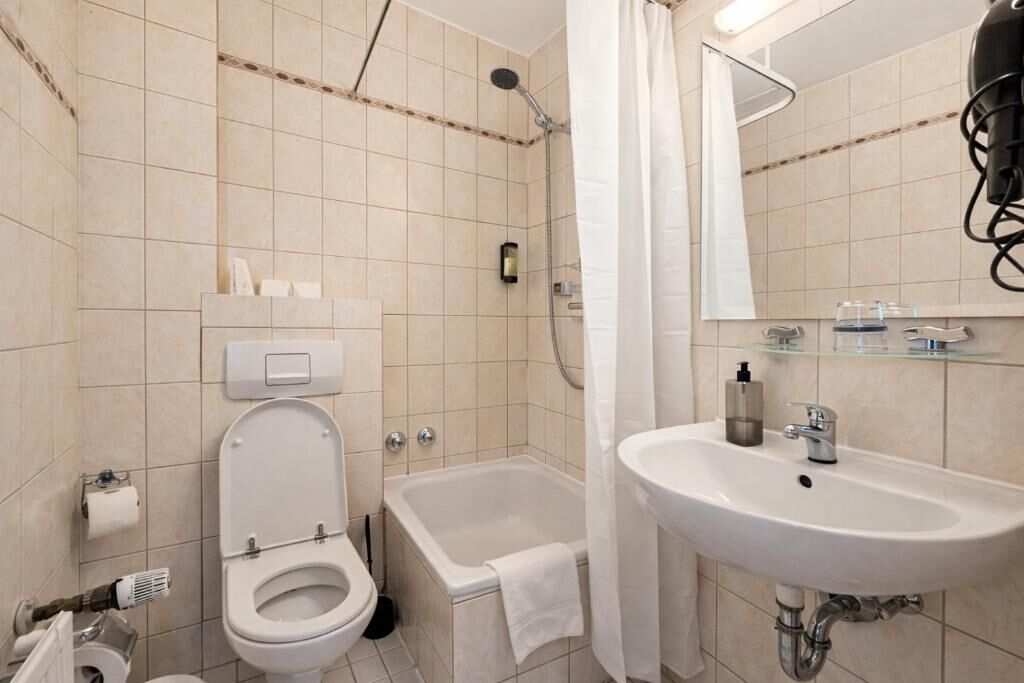 Hair dryer, towels, soap, shampoo