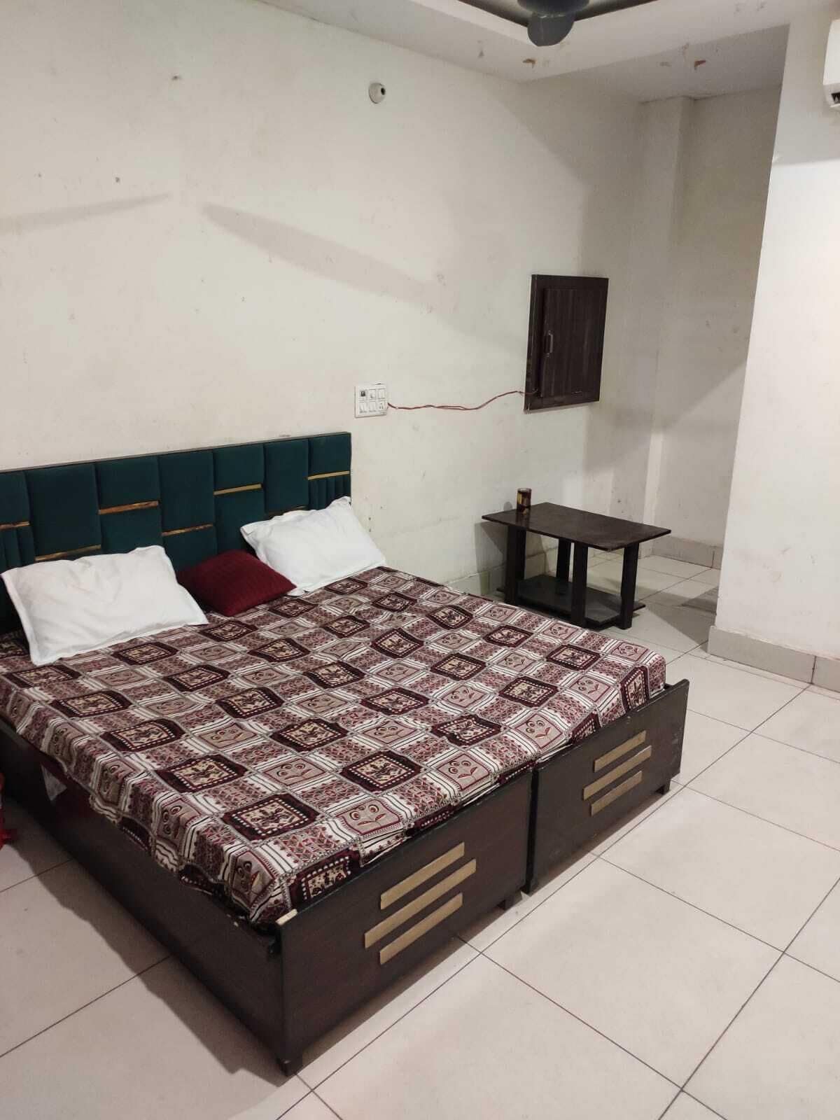 Habitación Deluxe | Camas supletorias y ropa de cama
