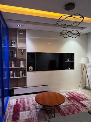 Suite superior, balcón | Interior
