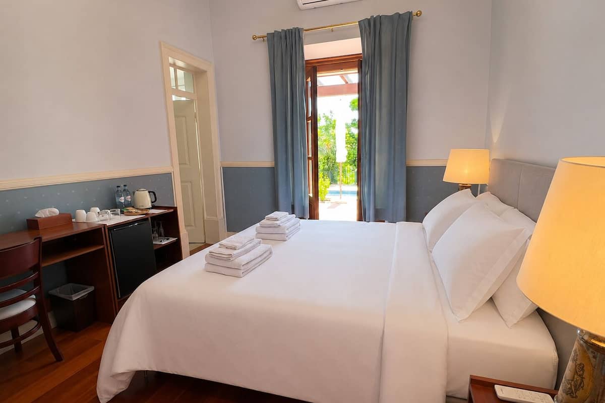 Deluxe Double or Twin Room, Pool View | Desk, laptop workspace, WiFi (free)
