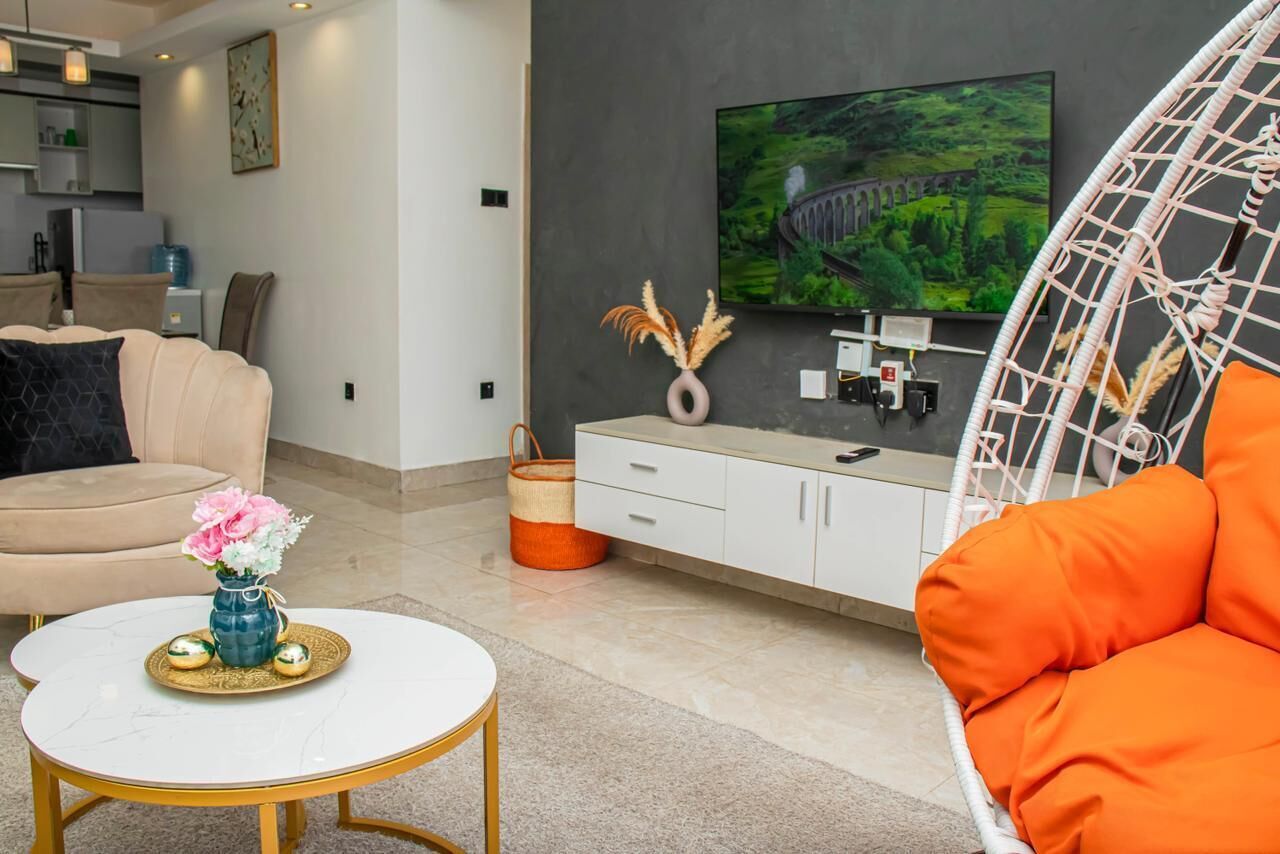 55-inch Smart TV with cable channels, Netflix, first-run films
