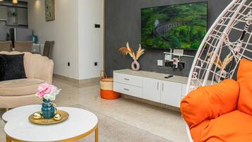55-inch Smart TV with cable channels, Netflix, first-run films