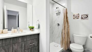 Shower, hair dryer, shampoo