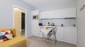 Appartamento Superior, bagno privato, vista città | Interni