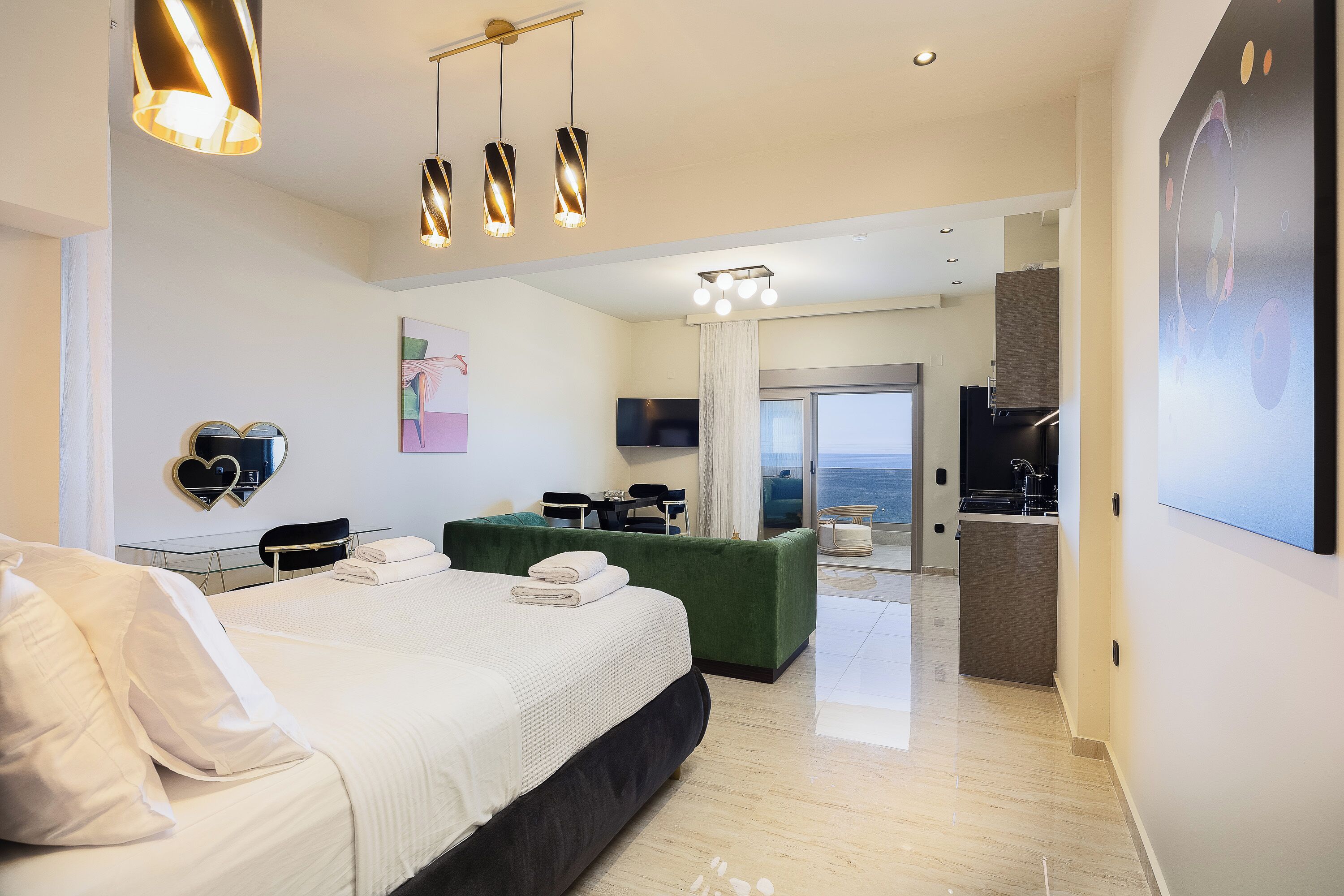 Deluxe Suite, Balcony, Sea View | Laptop workspace, blackout drapes, soundproofing, iron/ironing board