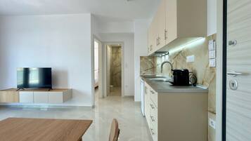 Departamento Confort, balcón, vista a la ciudad | Interior