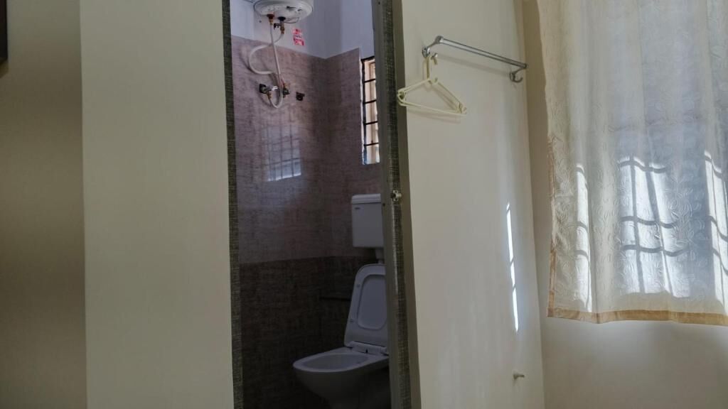 Ducha, toallas, jabón y champú