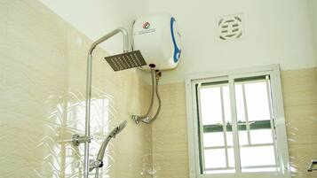 Premium Studio Suite, Balcony | Bathroom | Hair dryer, slippers, towels, soap
