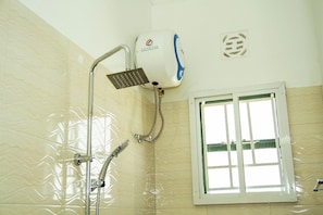 Premium Studio Suite, Balcony | Bathroom | Hair dryer, slippers, towels, soap - Maasai villa (Arusha)