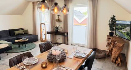 "Trautes Heim" vacation rental in the water town of Nordhorn, featuring a private sauna and hot tub, 2 bedrooms, and a lovely balcony. Pets Welcome – Vacation, Relaxation, and Comfort for Up to 4 People
