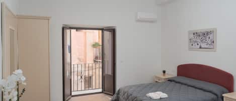 Deluxe Quadruple Room, Balcony | Free WiFi