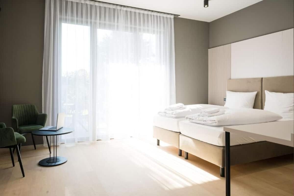 Superior Studio, Mobility Accessible, Patio | Hypo-allergenic bedding available, laptop workspace, blackout drapes
