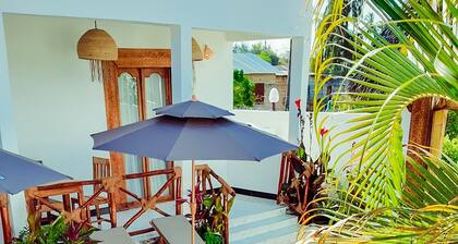 Villa with two double master suites, a private pool, and an exclusive beach area