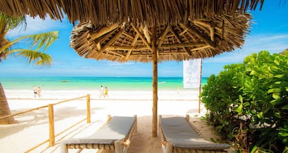 Villa with two double master suites, a private pool, and an exclusive beach area