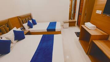 Desk, laptop workspace, free WiFi, bed sheets