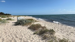 A sandy beach with sparse vegetation and a clear blue sky. - 4 Star Holiday Home in Sydals (Sydals)