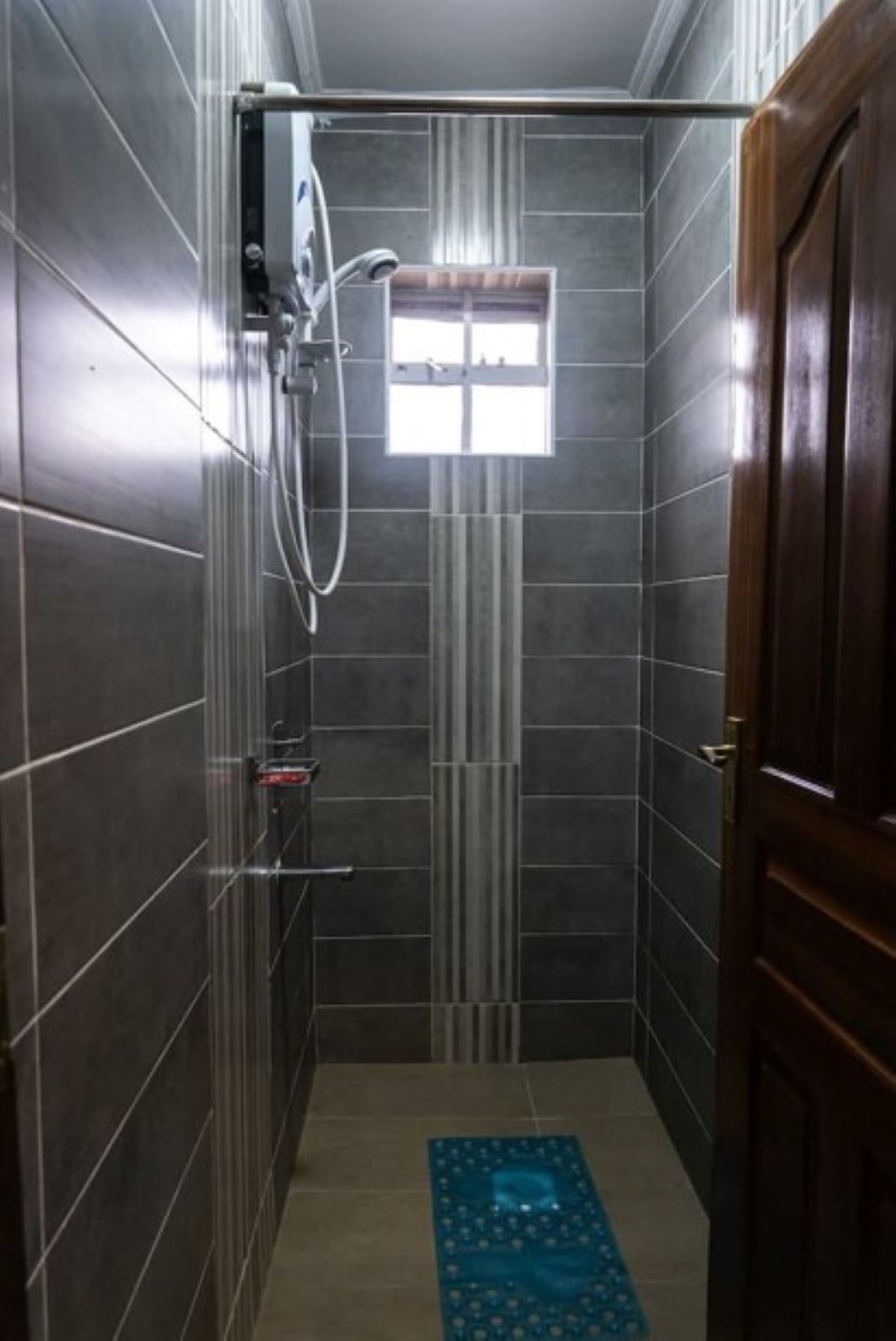 Shower, free toiletries, slippers, towels