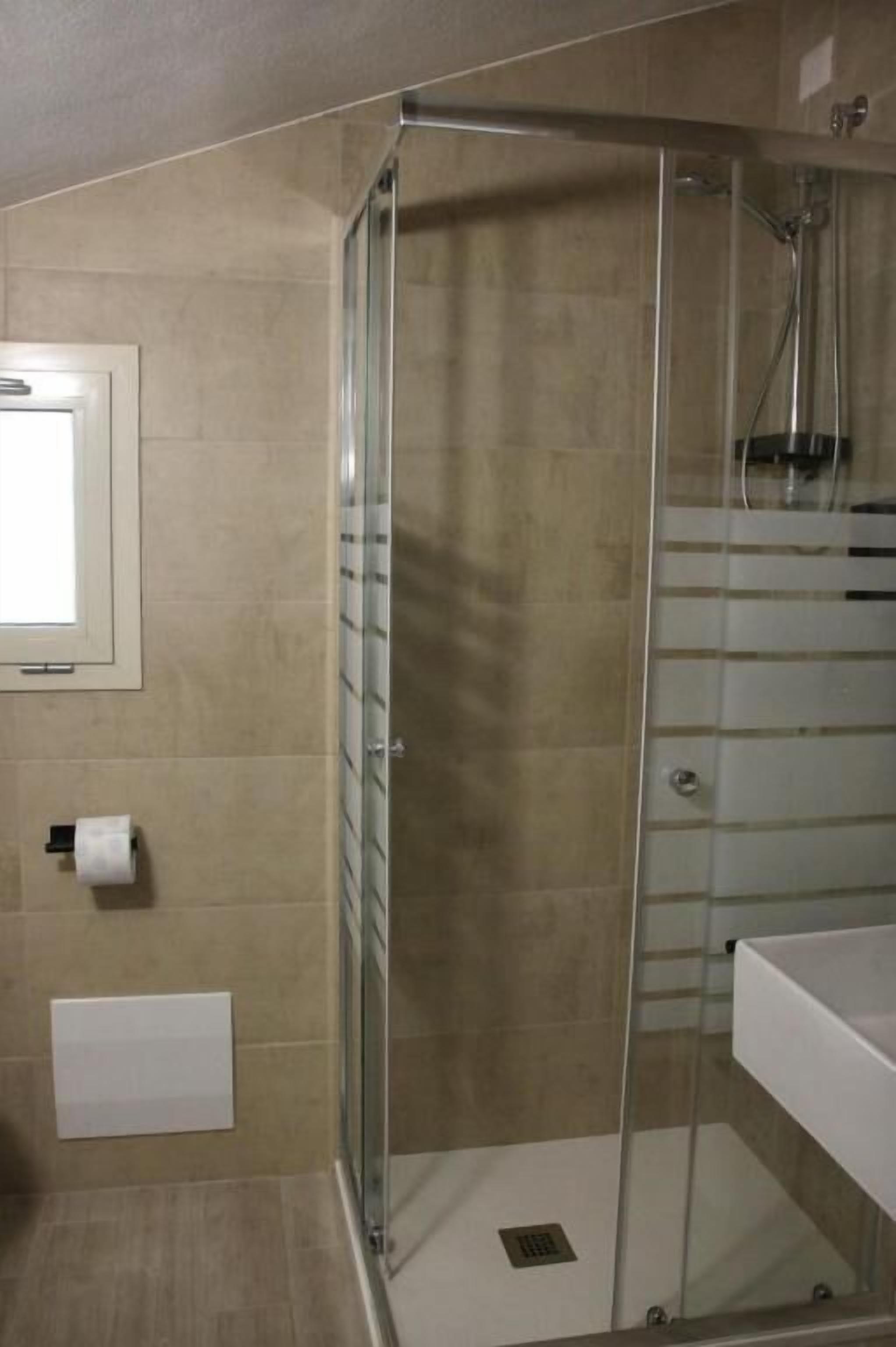 Shower, free toiletries, hair dryer, towels