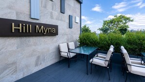 A modern building with a sign reading 'Hill Myna.' - Mountain View Condo by Bang Tao Beach-MynaC289 (ตำบลเชิงทะเล)