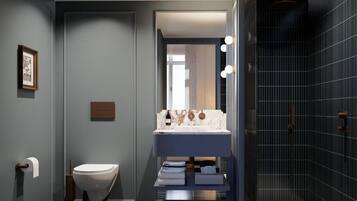 Shower, free toiletries, hair dryer, towels