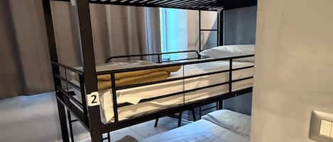 Premium bedding, down duvets, blackout curtains