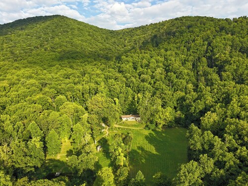 Private 12-acre retreat with hot tub, trails, pond and creek near Asheville