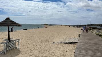 Beach nearby, beach umbrellas, beach towels