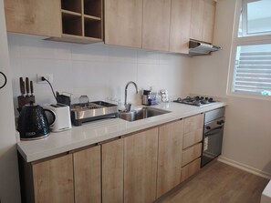 Apartment | Private kitchen - Oceana Suites Mirador Peñuelas II (Coquimbo)