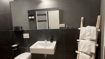 Studio, Private Bathroom | Bathroom | Shower, hair dryer, towels, soap