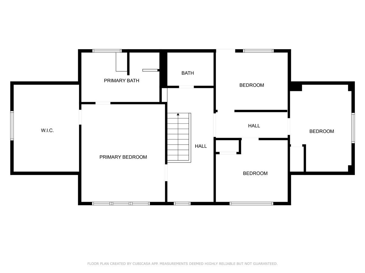 Un plan d’étage comprenant des toilettes, une chambre principale, une salle de bain principale, deux chambres, deux couloirs et une salle de bain.